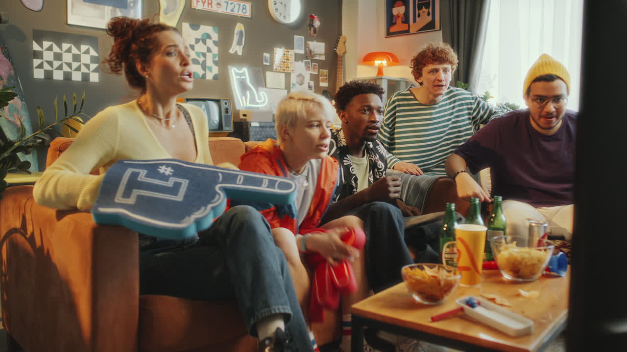 Friends Celebrating Victory of Sports Team as Watching TV Game at Home