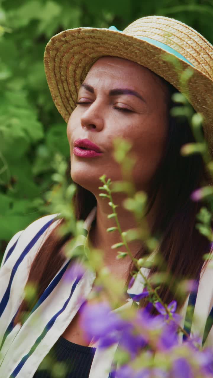 A Serene Moment in Nature: A Woman Enjoys the Tranquility of the Outdoors Surrounded by Vibrant Flora and Gentle Breezes, Embracing Peace and Relaxation