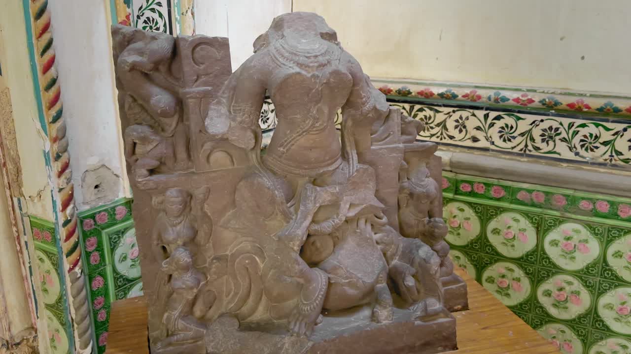 Headless stone sculpture of a divine female figure, likely Goddess Durga or a Yogini, showcasing intricate 9th–10th century carvings from Madhya Pradesh