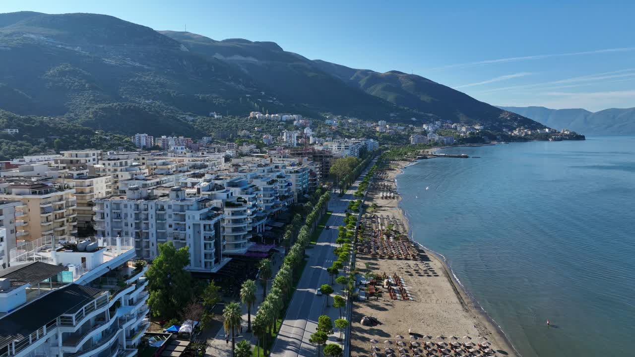 Seaside Hotels at Mediterranean Coast in Vlore Albania AERIAL PULLBACK