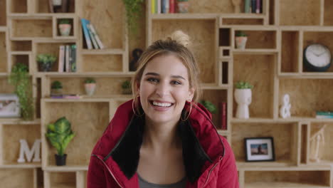 portrait of lovely young woman wearing red jacket laughing cheerful feeling motivated