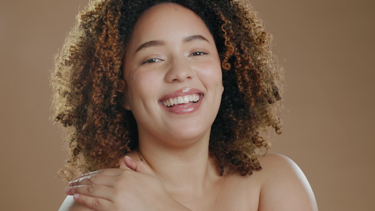 Face, black woman and skincare for shine