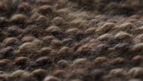 micro vídeo de primer plano de tela de lana de punto marrón con espacio para copiar