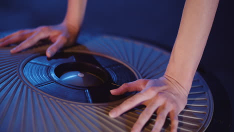 closeup of female athlete exercising with balance trainer in fitness studio