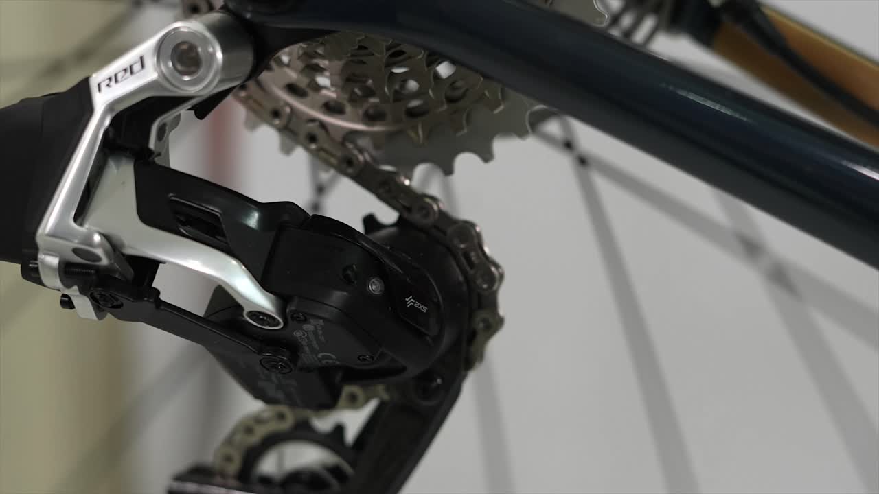 Close-up of a SRAM RED rear derailleur and bike cassette