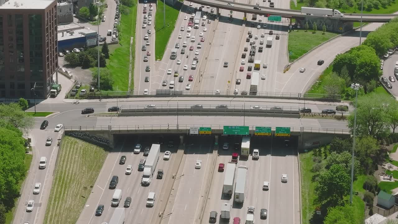 Busy traffic scene in aerial view of Chicago highway during daytime