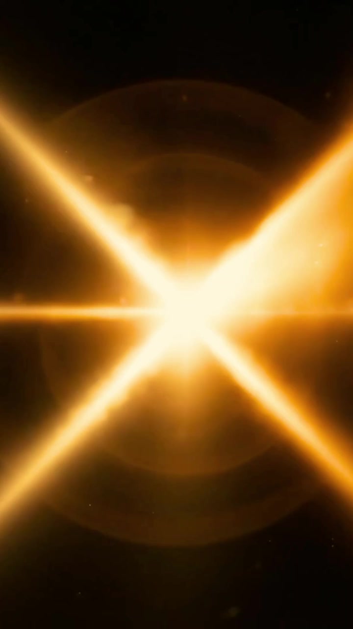 Heldere gouden lensflare uitdijend op zwarte achtergrond
