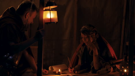 ancient scholars studying in a tent