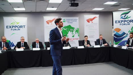 speaker engages audience at a business forum