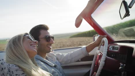 Side-view-video-of-happy-couple-on-the-way-to-vacation