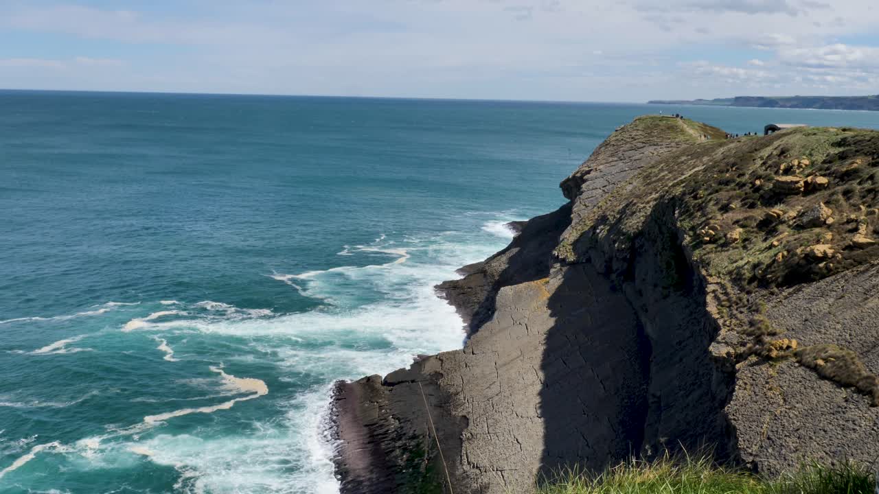 Ocean Waves Washing On Big Rocks In Shoreline Of big Rocky Mountain