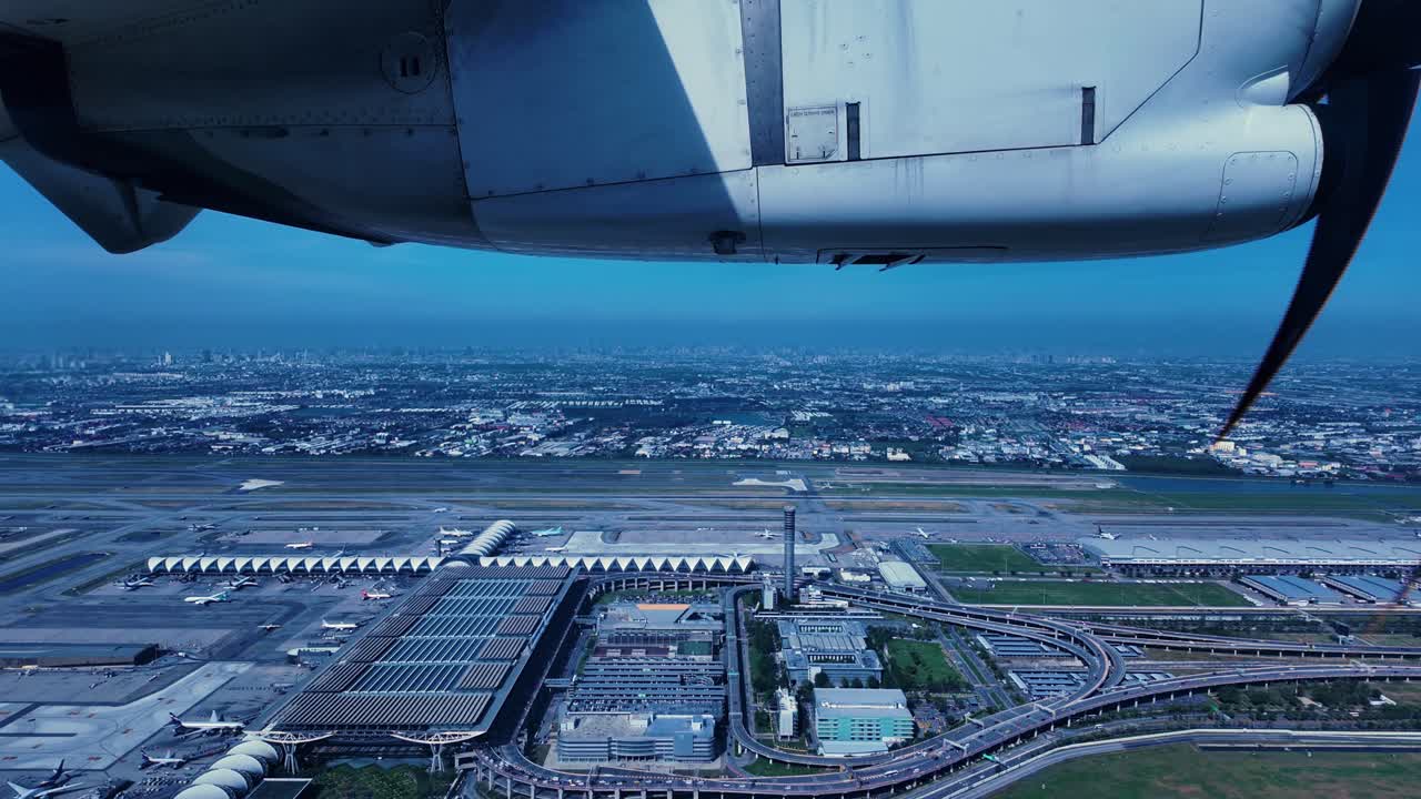 Bangkok Suvarnabhumi Airport Thailand take-off window view propeller plane