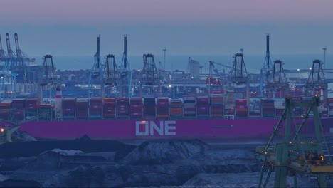 background of ect delta terminal, foreground of bulk coal in storage