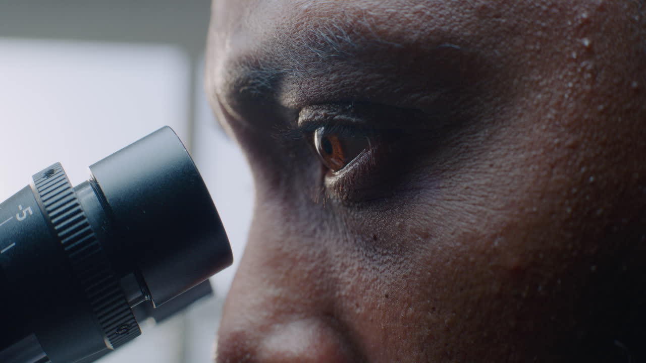 Scientist using Microscope