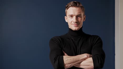 man in black turtleneck