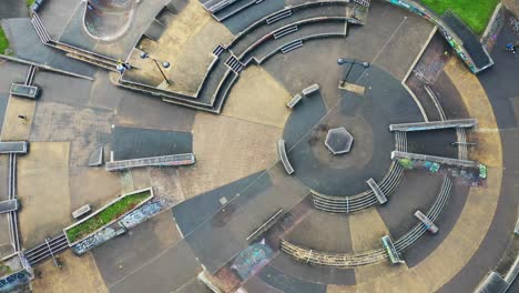 Overhead-aerial-view-of-Hanley-forest-park,-Central-forest-park,-Hanley-park,-Plaza-skatepark-in-Stoke-on-Trent-Staffordshire