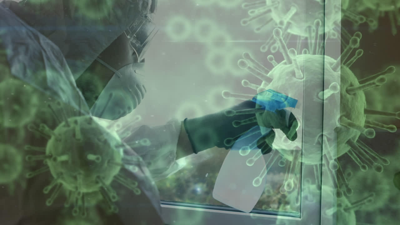 клетки covid-19 движутся против человека, носящего маску и использующего спринклер.