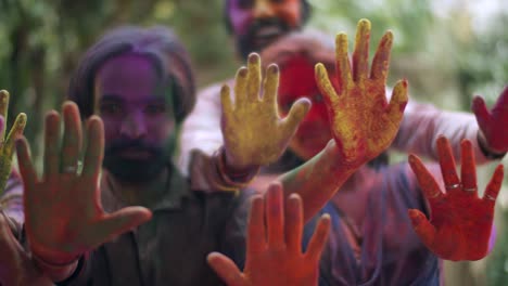 multi ethnic people celebrating the festival of colors holi in india