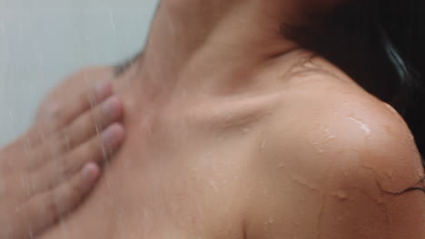 attractive woman taking shower touching wet skin enjoying luxury spa cleansing smooth complexion