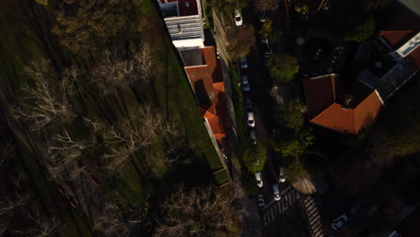 residential building from above, acute angle house, orange roof, street, road