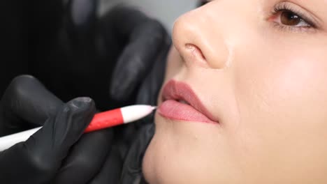 close-up of a woman receiving permanent lip makeup