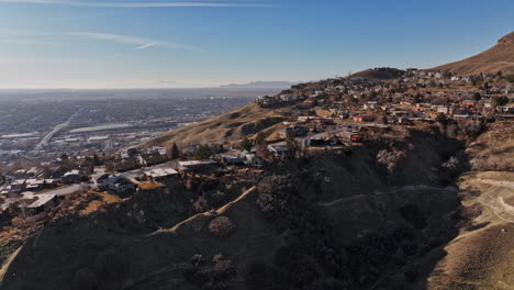 salt lake city utah aerial v69 cinematic low level flyover capitol hill capturing car driving uphill and beautiful victorian homes in hillside neighborhood - shot with mavic 3 cine - february 2022