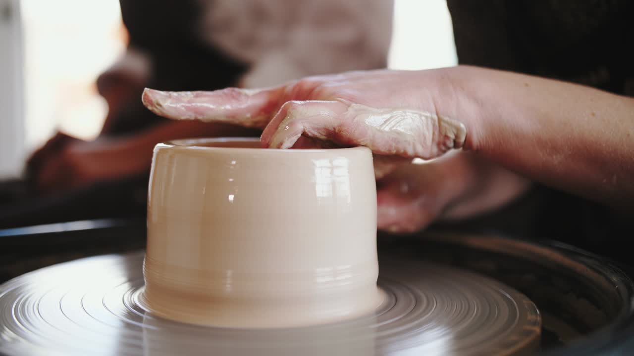 footage of pottery wheel work