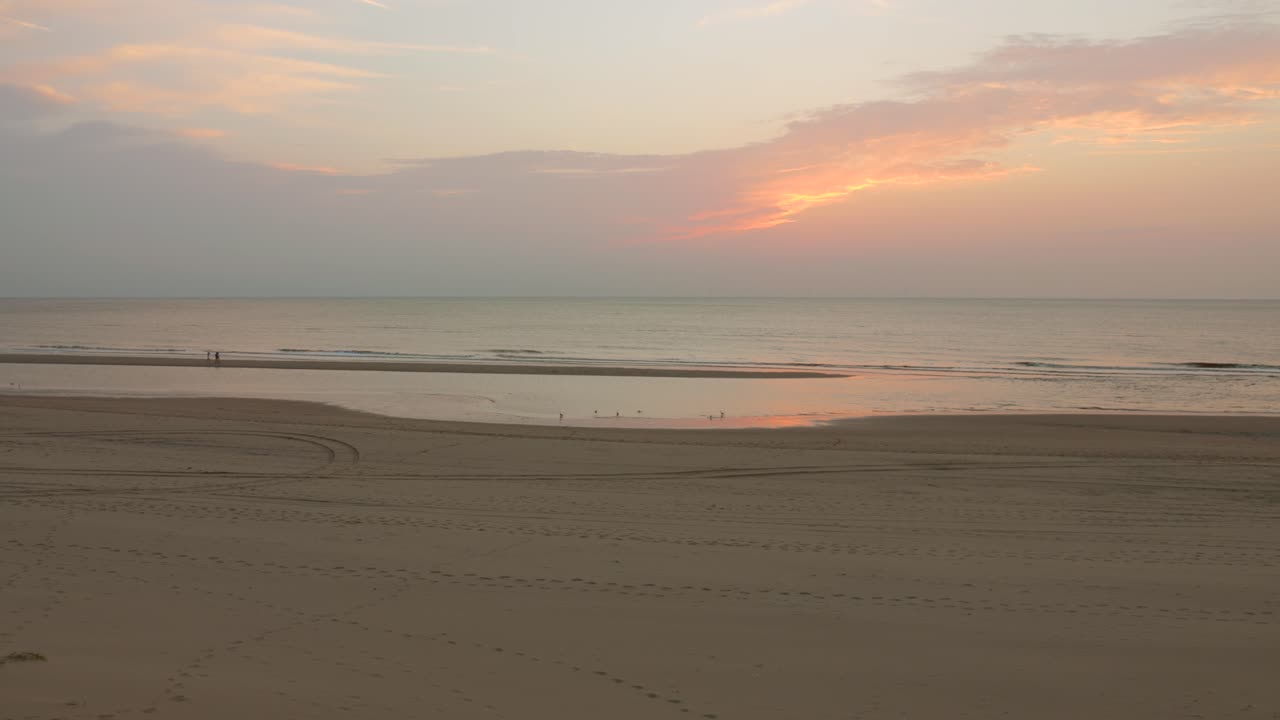 Tranquility Over Summer Beach During Sunrise. Aerial Wide Shot