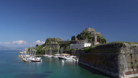 Smooth-panning-shot-to-still-shot-of-The-Old-Fortress-in-Kerkyra,-Corfu,-Greece