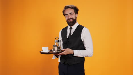 Smiling-waiter-posing-with-food-tray