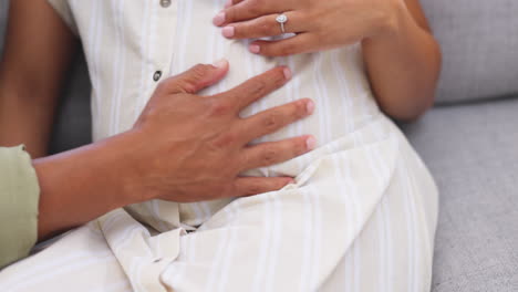 couple, pregnant stomach and person hands on belly