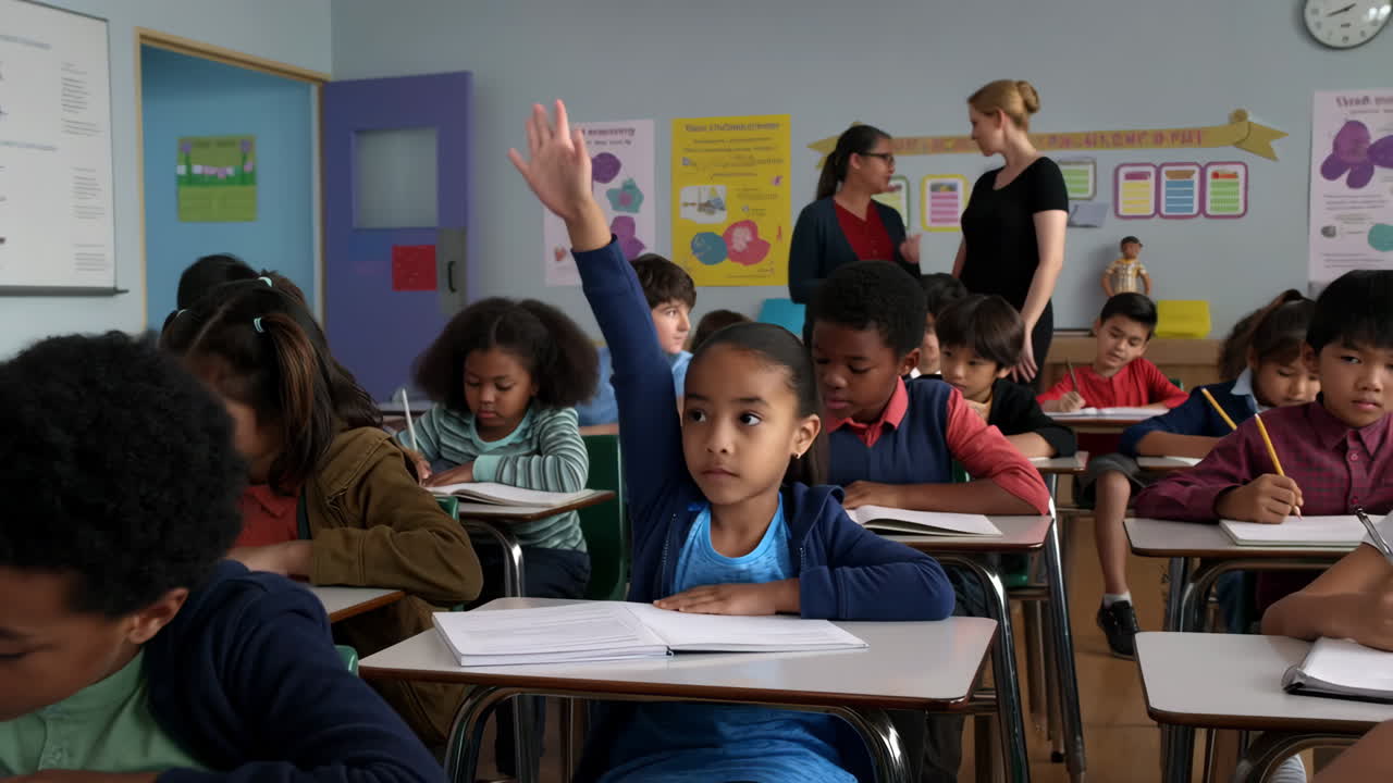 A young student raises her hand in a diverse classroom