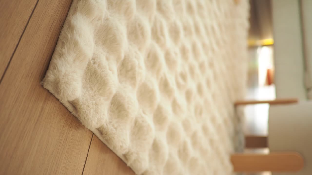 Cream Textured Rug on Wooden Floor