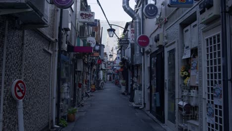 daytime charm of golden gai, shinjuku tokyothe rustic charm of golden gai’s bar-lined alleys under the soft daytime light.