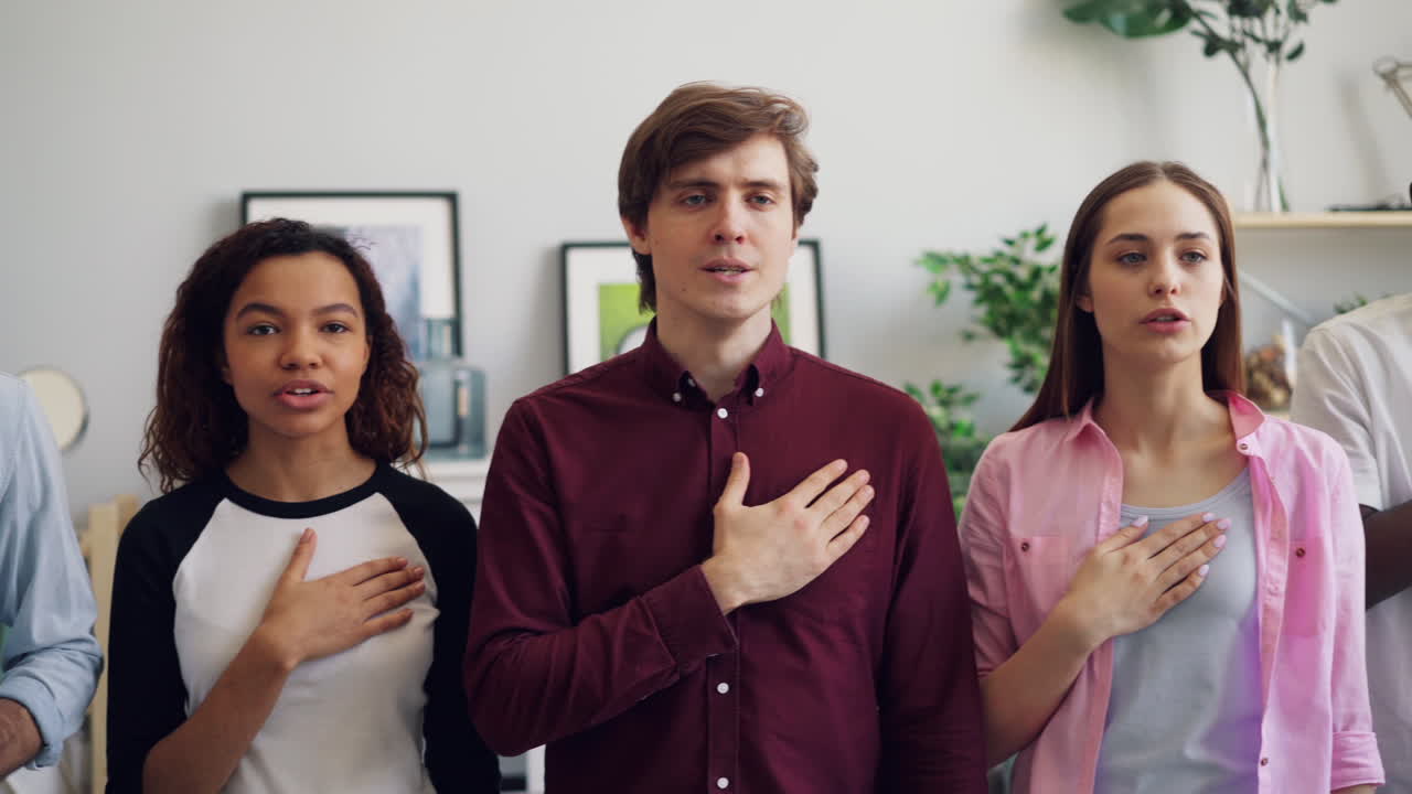Group of people taking an oath or pledge