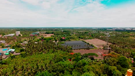 View-of-the-surrounding-landscape-looking-out-from-the-top-of-Wat-Samphran-Dragon-Temple,-Sam-Phran-province-Thailand