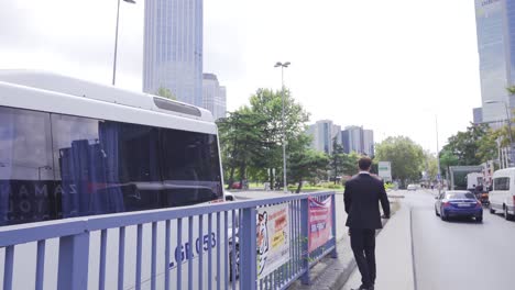 legs of a man riding an electric ecological scooter.