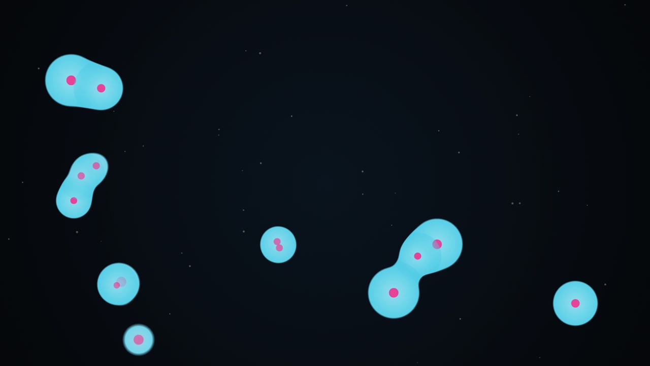 Células microscópicas animadas dividindo-se em um espaço escuro