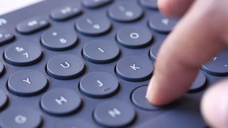 close up of man hand typing on keyboard