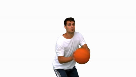 Un-Hombre-Guapo-Jugando-Con-Una-Pelota-De-Baloncesto-En-Una-Pantalla-Blanca.