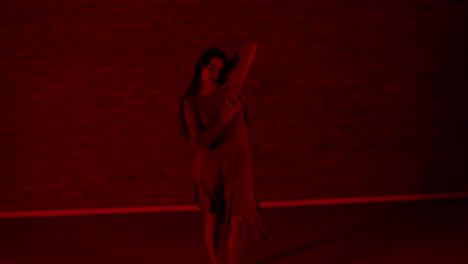 female dancer dancing in the red room