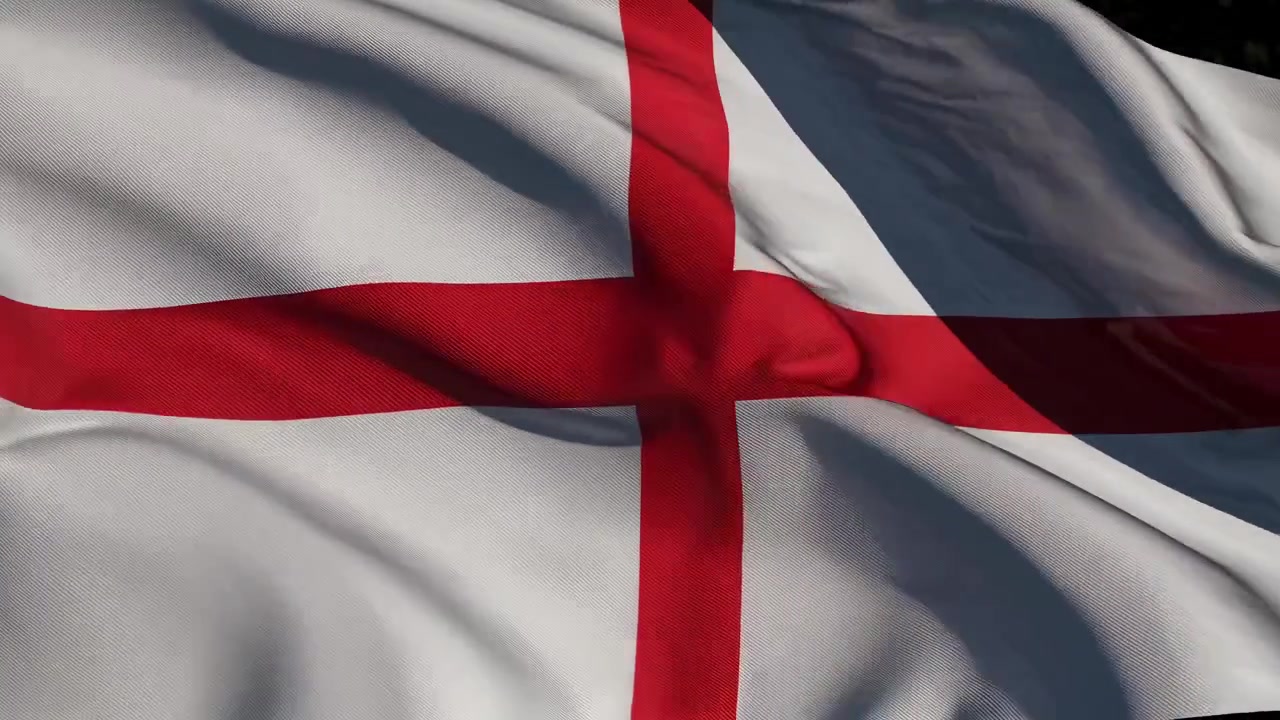 Primo piano della bandiera dell'Inghilterra che sventola al rallentatore