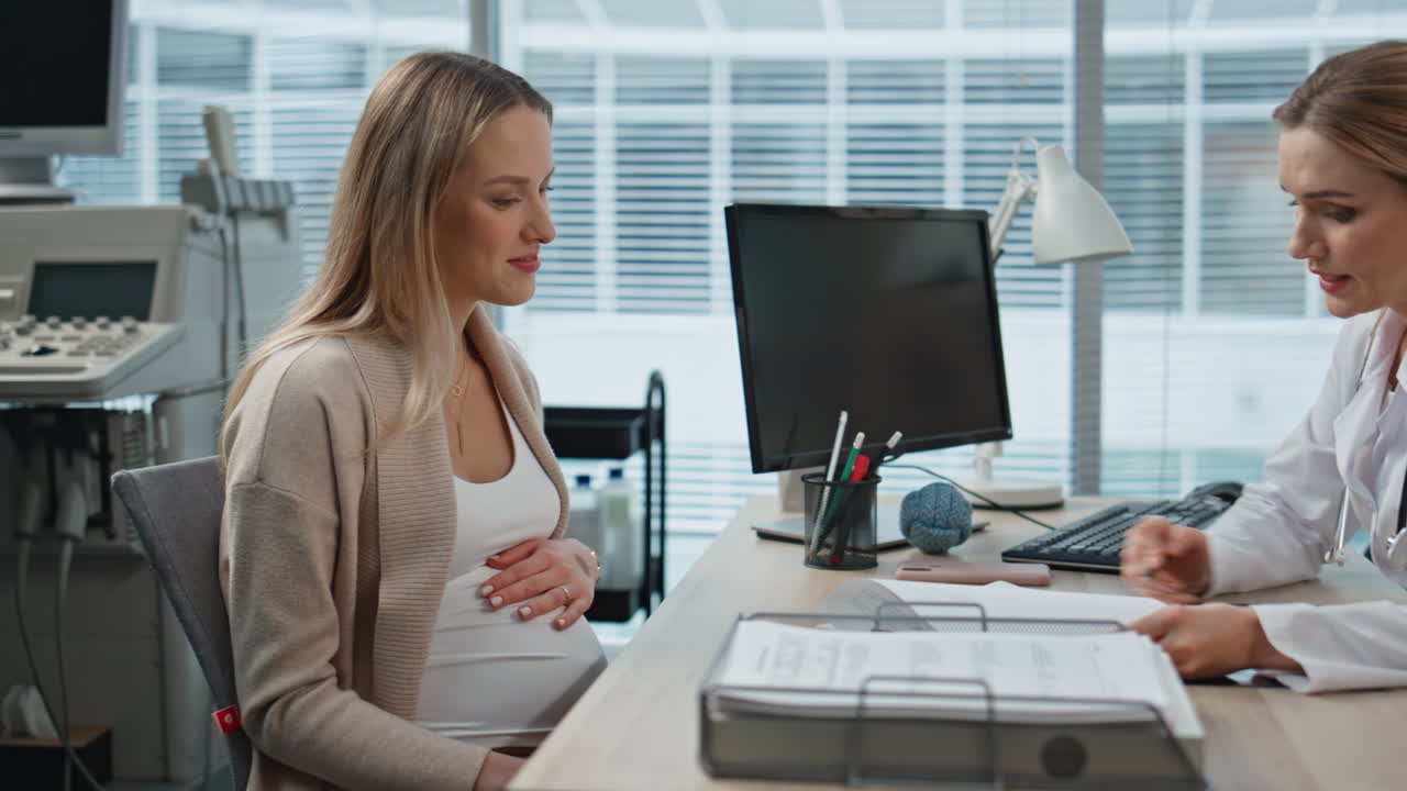 Woman doctor explaining diagnosis during appointment. Closeup smiling expectant