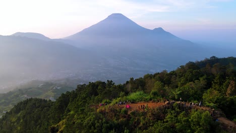 Fly-over-Sikinur-peak-at-sunrise,-Indonesia-landscape