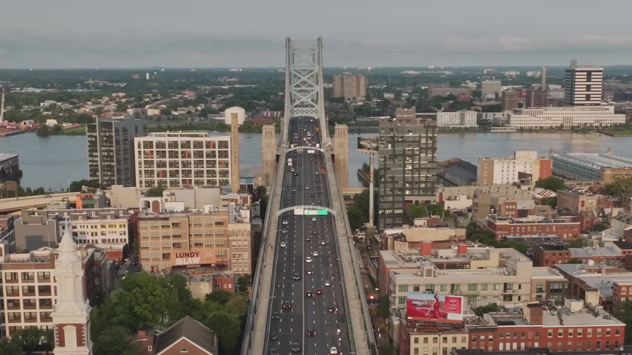 Aerial view of Philadelphia skyline and Ben Franklin Bridge during sunset