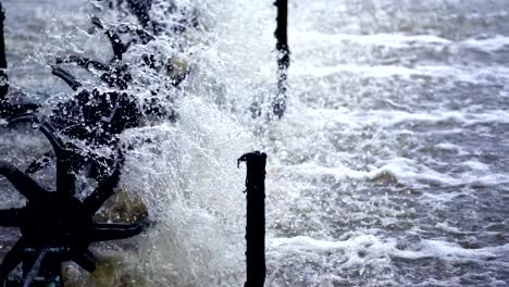 close up aerator turbine wheels bringing oxygen into water slow motion