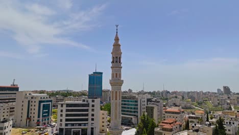 tall mosque minaret in the city of ramallah in the central west bank, palestine