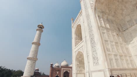 taj mahal, intricate details of landmark mausoleum. tilt down