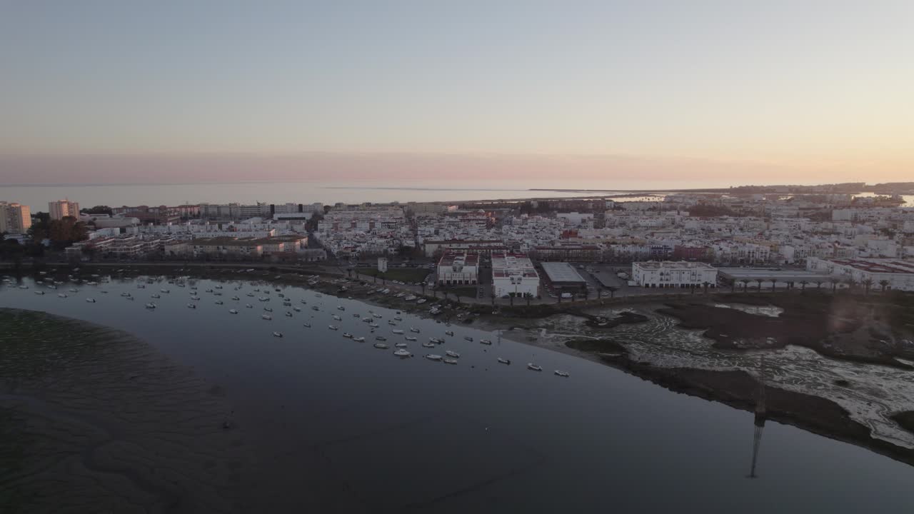 Aerial View of Isla Cristina Cityscape Basking in the Setting Sun's Glow, Spain