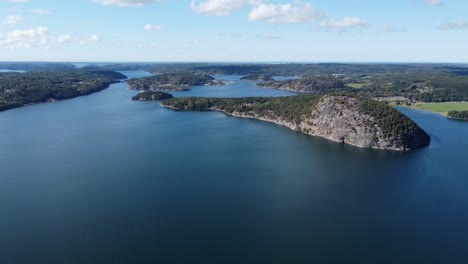 aerial drone to the side footage of a fjord in northern europe